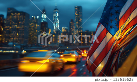 American Flag Over Busy New York Street with Yellow Taxis and Illuminated Skyline at Twilight 132619628