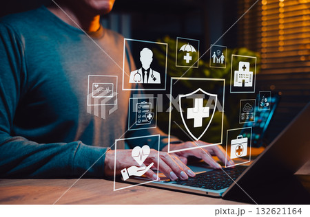 Health insurance and medical care concept. Person using laptop with health icons represent digital health insurance services, medical care, medication, hospitals, healthcare, patient data protection 132621164
