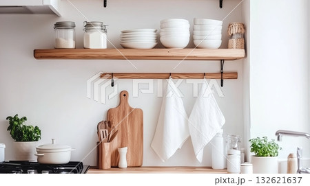 Modern kitchen interior with clean lines and organized shelves in daylight 132621637