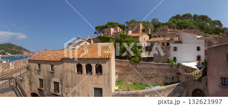 Stone houses with tiled roofs in Tossa de Mar Spain 132623997