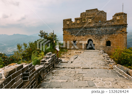 Aerial view of Simatai section of Great Wall of China in its original, un-restored state. Watchtowers perched on mountain peaks, Beijing, China. High quality photo Aerial view of Simatai section of Great Wall of China in its original, un-restored state. Watchtowers perched on mountain peaks, Beijing, China. High quality photo 132626424