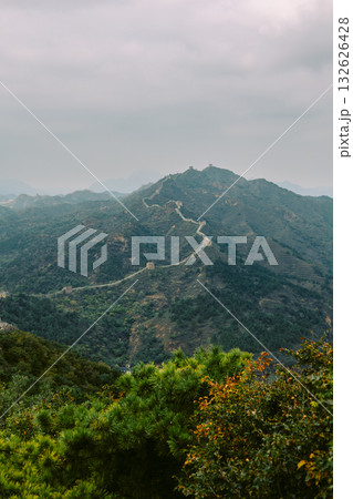 Aerial view of Simatai section of Great Wall of China in its original, un-restored state. Watchtowers perched on mountain peaks, China, Beijing. Vertical photo. High quality photo Aerial view of Simatai section of Great Wall of China in its original, un-restored state. Watchtowers perched on mountain peaks, China, Beijing. Vertical photo. High quality photo 132626428