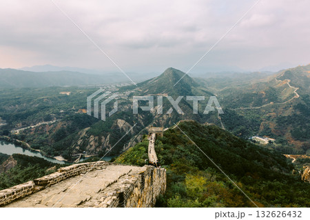 Aerial view of Simatai section of Great Wall of China in its original, un-restored state. Watchtowers perched on mountain peaks, Beijing, China. High quality photo Aerial view of Simatai section of Great Wall of China in its original, un-restored state. Watchtowers perched on mountain peaks, Beijing, China. High quality photo 132626432