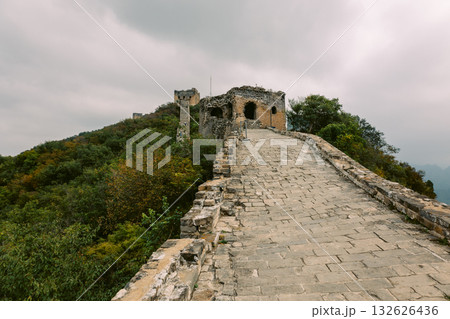 Aerial view of Simatai section of Great Wall of China in its original, un-restored state. Watchtowers perched on mountain peaks, Beijing, China. High quality photo 132626436