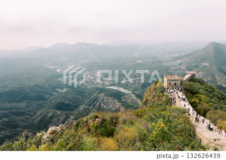 Aerial view of Simatai section of Great Wall of China in its original, un-restored state. Watchtowers perched on mountain peaks, Beijing, China. High quality photo Aerial view of Simatai section of Great Wall of China in its original, un-restored state. Watchtowers perched on mountain peaks, Beijing, China. High quality photo 132626439