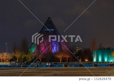 Modern architectural urbanistic city Astana. Futuristic buildings, pyramids of night city, Nur-Sultan, Astana, Kazakhstan. High quality photo 132626470