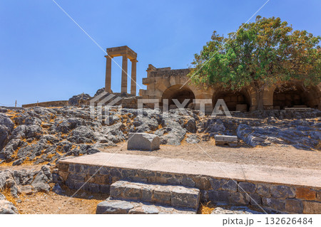 Panoramic view of ruins of ancient city of Lindos on colorful island of Rhodes, Greece. Famous tourist attraction. Ancient temple Greek architecture. High quality photo 132626484