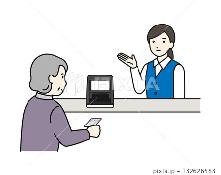 マイナンバーカード受付を案内する事務員 132626583