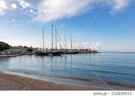 Panoramic view of beautiful yachts stand in harbor in port of Rhodes, Greece. High quality photo Panoramic view of beautiful yachts stand in harbor in port of Rhodes, Greece. High quality photo 132626613