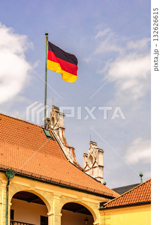 Germany flag flies on roof. High quality photo Germany flag flies on roof. High quality photo 132626615