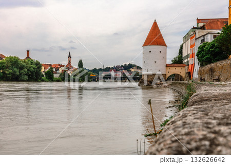 Panoramic view Schaibling Tower and promenade on river Inn, Passau, Lower Bavaria, Germany. 132626642