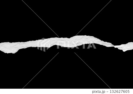 Ripped torn paper edges isolated on black background Ripped torn paper edges isolated on black background 132627605