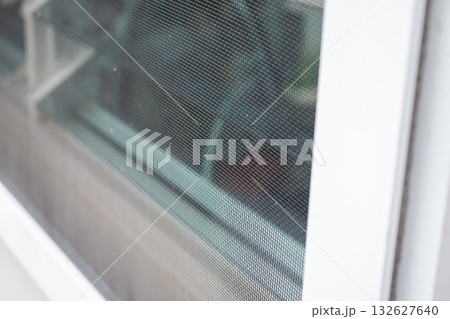 mosquito net wire screen on house window protection against insect 132627640