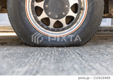 Low air pressure in worn tire. 132628469