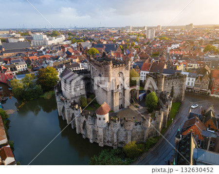 Aerial panorama of Ghent featuring the iconic Gravensteen and the rooftops of the old city. Aerial panorama of Ghent featuring the iconic Gravensteen and the rooftops of the old city. 132630452