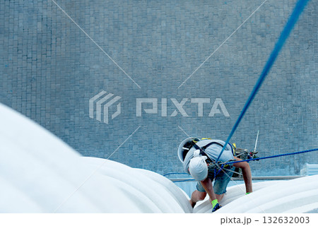 high-altitude climber. The profession of working at height. 132632003