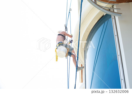 high-altitude climber. The profession of working at height. high-altitude climber. The profession of working at height. 132632006