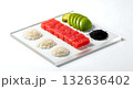 Minimalist flat lay, sushi ingredients arranged in a color-blocked style neat piles of white rice, vibrant pink tuna, green avocado, and black sesame seeds Minimalist flat lay, sushi ingredients arranged in a color-blocked style neat piles of white rice, vibrant pink tuna, green avocado, and black sesame seeds 132636402