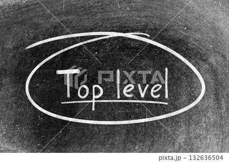 White chalk hand writing in word top level and circle shape on blackboard background White chalk hand writing in word top level and circle shape on blackboard background 132636504