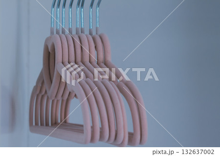 Children's pink velvet hangers with heart for girls clothes in empty wardrobe 132637002