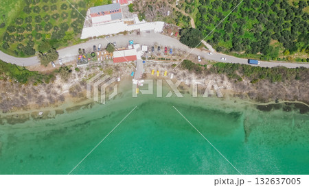 Lake Kournas in Crete aerial view of pedal boat rental clear water and scenic Greek nature. 132637005