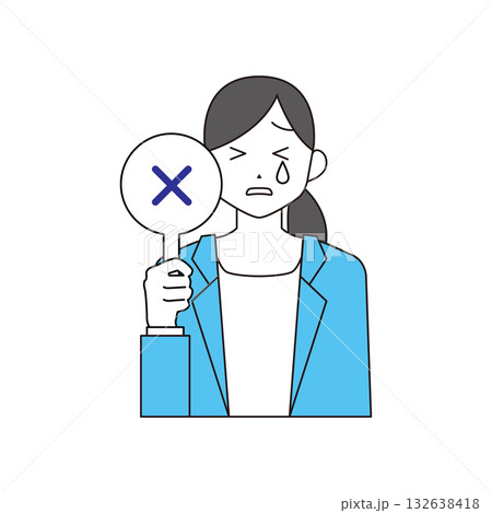 バツの回答札を出すスーツを着た女性 132638418