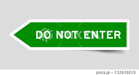 Green color arrow shape sticker label with word do not enter on gray background 132638819