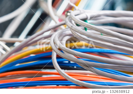 Detail of server room with bunch of fiber optic cables and ether 132638912
