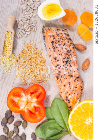 Nutritious products and ingredients containing differents vitamins or minerals for healthy hair 132639631