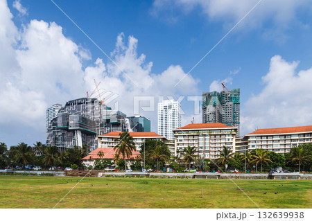A vibrant urban scene featuring futuristic buildings under construction, Colombo city 132639938