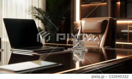 Laptop computer on a desk in a modern room with natural light and minimalist decor 132640382