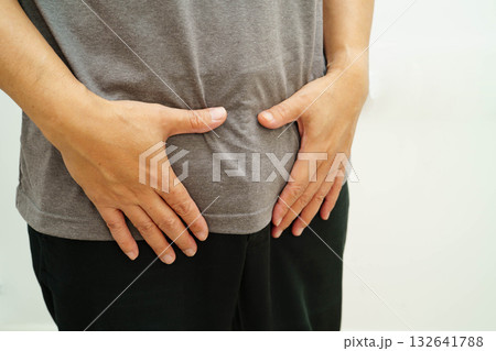 Hernia, Asian man stomach ache, abdominal pain and urology problem health. Hernia, Asian man stomach ache, abdominal pain and urology problem health. 132641788