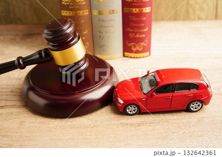 Bangkok, Thailand March 15, 2023 Car accident lawsuit and insurance, Judge hammer with car model. Bangkok, Thailand March 15, 2023 Car accident lawsuit and insurance, Judge hammer with car model. 132642361