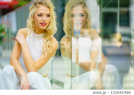 Fashionable woman in city 132642480