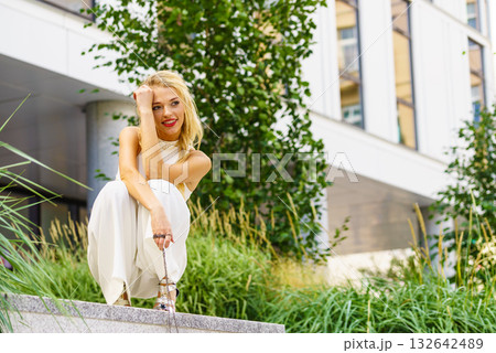 Woman wearing crop top and culottes 132642489