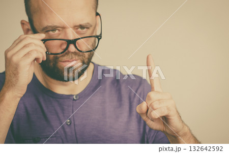 Adult man being angry pointing with finger 132642592