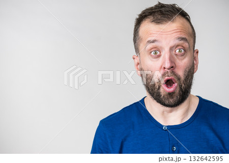 Astonished shocked adult man 132642595