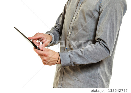 Closeup of human using pc tablet browsing internet Closeup of human using pc tablet browsing internet 132642755