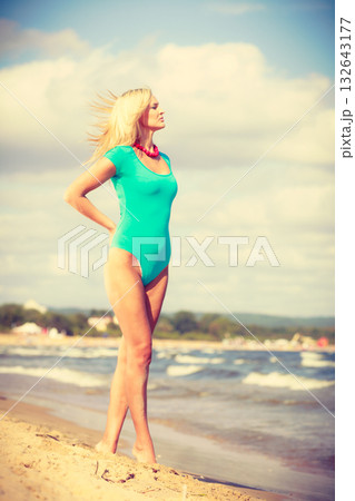 Beautiful woman standing with costume. Beautiful woman standing with costume. 132643177