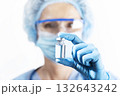 Healthcare Professional Holding a Vaccine Vial 132643242