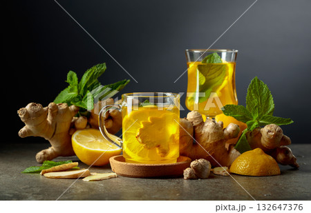 Ginger tea with lemon and mint. Ginger tea with lemon and mint. 132647376