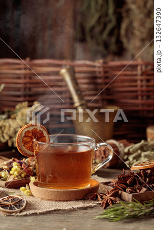 Tea with ingredients and slices of dried oranges. Tea with ingredients and slices of dried oranges. 132647390