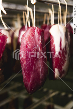 Smoked sausage production line in the factory 132647429