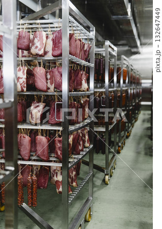 Smoked sausage production line in the factory Smoked sausage production line in the factory 132647449