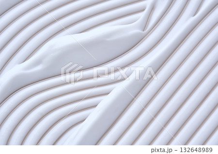 Beautiful waves of cream close-up. Beauty background. 132648989