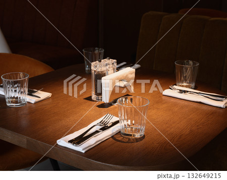informal meal gathering, group of individuals enjoying relaxed meal together around rustic wooden informal meal gathering, group of individuals enjoying relaxed meal together around rustic wooden 132649215