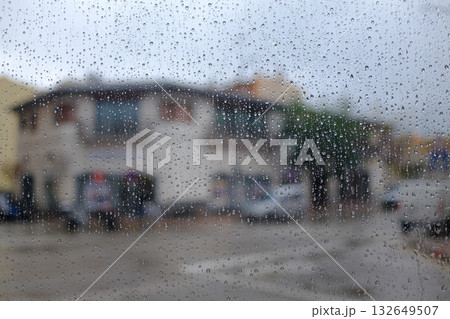 cityscape scene with water raining and color lights cityscape scene with water raining and color lights 132649507