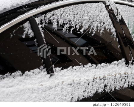 Thick Hoarfrost Ice Crystals Forming on Metal and Glass Surface in Winter 132649591