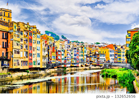 Colorful houses along the Onyar River, also known as hanging houses, in the city of Girona, Catalonia, Spain Colorful houses along the Onyar River, also known as hanging houses, in the city of Girona, Catalonia, Spain 132652656