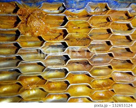 Industrial Plate Heat Exchanger Showing Buildup in Plate Pack During Maintenance Process 132653124